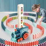 Petit train éléctrique pose dominos