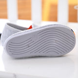 Chaussons en tissu de coton à motif dinosaure