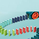 Petit train éléctrique pose dominos