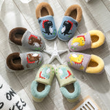 Pantoufles fourrées motif dinosaure
